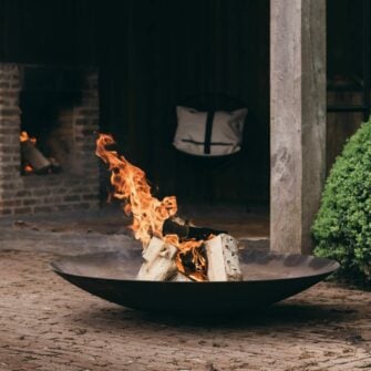 Cortenstaal vuurschaal rond bij poolhouse