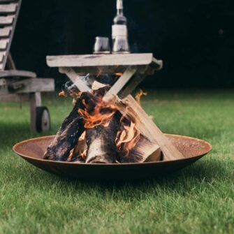Corten steel fire bowl around in the garden